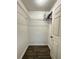 Walk-in closet with wire shelving and wood flooring at 16103 Waldrop Cv, Decatur, GA 30034