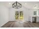 Bright dining area with sliding glass doors to deck at 1685 Harbin Sw Rd, Atlanta, GA 30311