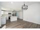 Bright dining room with hardwood floors and access to deck at 1685 Harbin Sw Rd, Atlanta, GA 30311