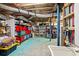 Unfinished basement with shelving for storage at 2129 Lakeland Ct, Dacula, GA 30019