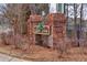 Lake Park community entrance with brick pillars and signage at 2129 Lakeland Ct, Dacula, GA 30019