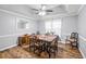 Spacious dining area with hardwood floors and a ceiling fan at 2129 Lakeland Ct, Dacula, GA 30019