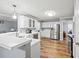 Modern kitchen with stainless steel appliances and white cabinets at 2129 Lakeland Ct, Dacula, GA 30019