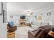 Spacious living room features a fireplace and hardwood floors at 2129 Lakeland Ct, Dacula, GA 30019