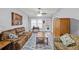 Comfortable living room with brown couch and wood coffee table at 2129 Lakeland Ct, Dacula, GA 30019