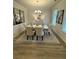 Formal dining room with a large table and hardwood floors at 4005 Riverchess Lot 127 Sw Dr, Atlanta, GA 30331