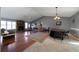 Open dining area with tile floors and hardwood floors at 113 Hillmont Dr, Woodstock, GA 30188