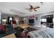 Living room with leather furniture and a large TV at 113 Hillmont Dr, Woodstock, GA 30188