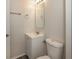 Clean bathroom with white vanity and toilet at 1203 Sandune Dr, Norcross, GA 30093