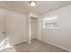 Well-lit bedroom featuring a closet and window at 1203 Sandune Dr, Norcross, GA 30093