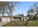 Ranch style home with attached two-car garage and a spacious yard at 1203 Sandune Dr, Norcross, GA 30093