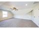 Large bonus room with neutral carpet, a ceiling fan, and a dormer window at 1330 Temple Draketown Rd, Temple, GA 30179