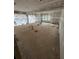 Large living room with drywall, windows, and unfinished flooring at 1330 Temple Draketown Rd, Temple, GA 30179