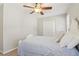 Bedroom with light colored walls, featuring a bed and bright window at 201 Nouveau Sw Ct, Lilburn, GA 30047