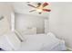 Neutral bedroom featuring a bed, dresser, and bright window at 201 Nouveau Sw Ct, Lilburn, GA 30047