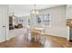 Dining area featuring a view of the living room, creating an open and inviting atmosphere at 201 Nouveau Sw Ct, Lilburn, GA 30047