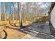 Private backyard with patio, deck, and wooded area at 2667 Flair Knoll Ne Dr, Atlanta, GA 30345