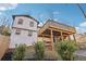 Elevated view of home's back, deck and landscaping at 2667 Flair Knoll Ne Dr, Atlanta, GA 30345