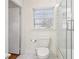 Clean bathroom with marble tile floors and a toilet at 2667 Flair Knoll Ne Dr, Atlanta, GA 30345