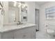 Modern bathroom with marble vanity and shower at 2667 Flair Knoll Ne Dr, Atlanta, GA 30345