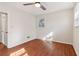 Bright bedroom with hardwood floors and ceiling fan at 2667 Flair Knoll Ne Dr, Atlanta, GA 30345