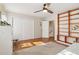 Spacious bedroom with built-in shelves and hardwood floors at 2667 Flair Knoll Ne Dr, Atlanta, GA 30345