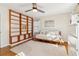 Well-lit bedroom with built-in shelves and hardwood floors at 2667 Flair Knoll Ne Dr, Atlanta, GA 30345