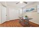 Bright home office with hardwood floors, desk, and large closet at 2667 Flair Knoll Ne Dr, Atlanta, GA 30345