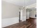 Bright dining room with hardwood floors and chandelier at 11602 Kades Trl, Hampton, GA 30228