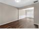 Bright dining room features hardwood floors and chandelier at 11602 Kades Trl, Hampton, GA 30228