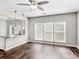 Bright dining area with hardwood floors and view to kitchen at 11602 Kades Trl, Hampton, GA 30228