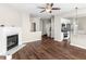 Open living room with hardwood floors and kitchen views at 11602 Kades Trl, Hampton, GA 30228