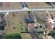 Property overview from above showing the house, outbuildings, and large grassy areas at 1349 Highway 81 E, Mcdonough, GA 30252