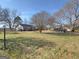 House and backyard with shed and trees at 1349 Highway 81 E, Mcdonough, GA 30252