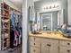 Bathroom with vanity, sink and large closet at 1349 Highway 81 E, Mcdonough, GA 30252