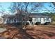 Ranch house with mature trees and a spacious yard at 1349 Highway 81 E, Mcdonough, GA 30252