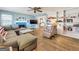 Open living room with built-in shelving and hardwood floors at 1349 Highway 81 E, Mcdonough, GA 30252