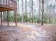 Wooded backyard with deck and ample space at 1853 Edington Sw Rd, Marietta, GA 30064