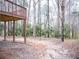 Wooded backyard with deck and ample space at 1853 Edington Sw Rd, Marietta, GA 30064