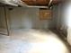 Unfinished basement with concrete floor and exposed utilities at 1853 Edington Sw Rd, Marietta, GA 30064