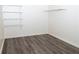 Spacious closet with wire shelving and hanging rod at 1853 Edington Sw Rd, Marietta, GA 30064