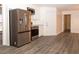 Stainless steel appliances and white cabinets in this kitchen at 1853 Edington Sw Rd, Marietta, GA 30064