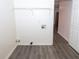 Laundry room with hookups and shelving at 1853 Edington Sw Rd, Marietta, GA 30064