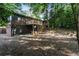 Spacious backyard with deck and wooded area at 2107 Seavey Dr, Decatur, GA 30032