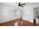 Light-filled bedroom with hardwood floors and ceiling fan at 2107 Seavey Dr, Decatur, GA 30032