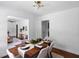 Dining area with hardwood floors and modern dining set at 2107 Seavey Dr, Decatur, GA 30032