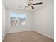 Spacious bedroom with ceiling fan and window at 2397 Foley Park St, Snellville, GA 30078