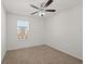 Spacious bedroom with ceiling fan and window at 2397 Foley Park St, Snellville, GA 30078