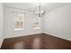 Spacious dining room featuring hardwood floors and large windows at 2397 Foley Park St, Snellville, GA 30078