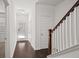 Simple entryway with hardwood floors and coat closet at 2397 Foley Park St, Snellville, GA 30078